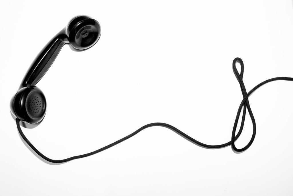 Photo by Quino Al black corded telephone