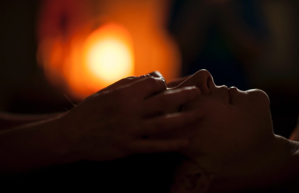 Photo by Katherine Hanlon persons hand on top of sun